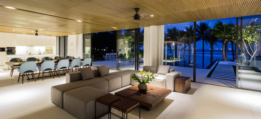 Luxury open-plan living and dining area at dusk