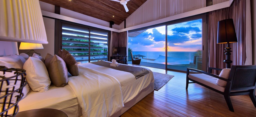 Upstairs Master bedroom including American King Size bed with seaview